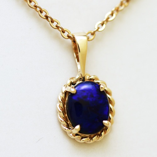 14k Yellow Gold Pendant with a SOLID BLACK OPAL Floral Harlequin pattern, sparkling and bright